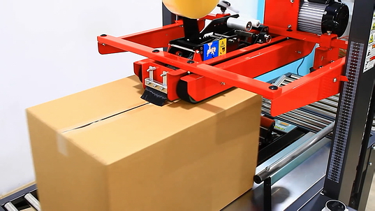 上下驱动胶带封箱机介绍